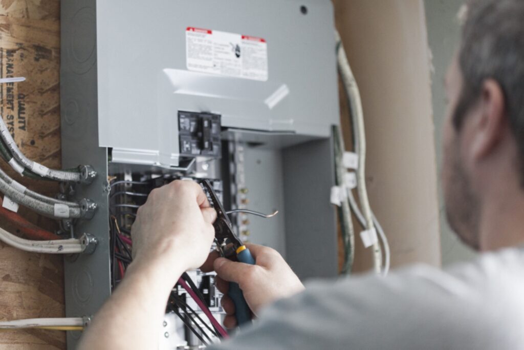 Electrician upgrading circuit panel